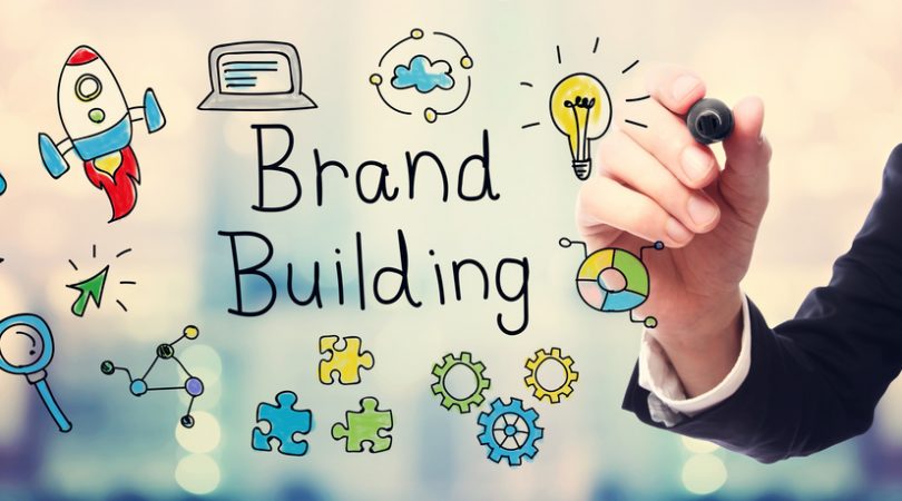 Businessman drawing Brand Building concept
